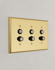 Solid brass Century Push Button Wall Plate – Triple in Polished Brass finish