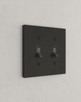 Solid brass Futura Toggle Wall Plate – Double in Coal Black Brass finish