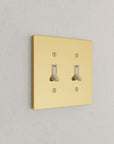 Solid brass Futura Toggle Wall Plate – Double in Polished Brass finish