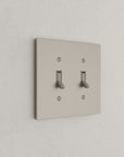 Solid brass Futura Toggle Wall Plate – Double in Satin Nickel finish
