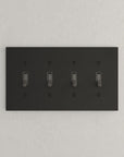 Solid brass Futura Toggle Wall Plate – Quad in Coal Black Brass finish