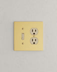 Solid brass Futura Toggle & Outlet Wall Plate – Double in Polished Brass finish