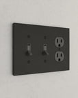 Solid brass Futura Toggle & Outlet Wall Plate – Triple in Coal Black Brass finish