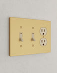 Solid brass Futura Toggle & Outlet Wall Plate – Triple in Satin Brass finish