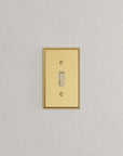 Solid brass Century Toggle Wall Plate in Polished Brass finish