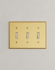 Solid brass Century Toggle Wall Plate – Triple in Polished Brass finish