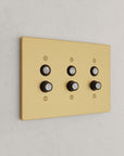 Solid brass Futura Push Button Wall Plate – Triple in Satin Brass finish