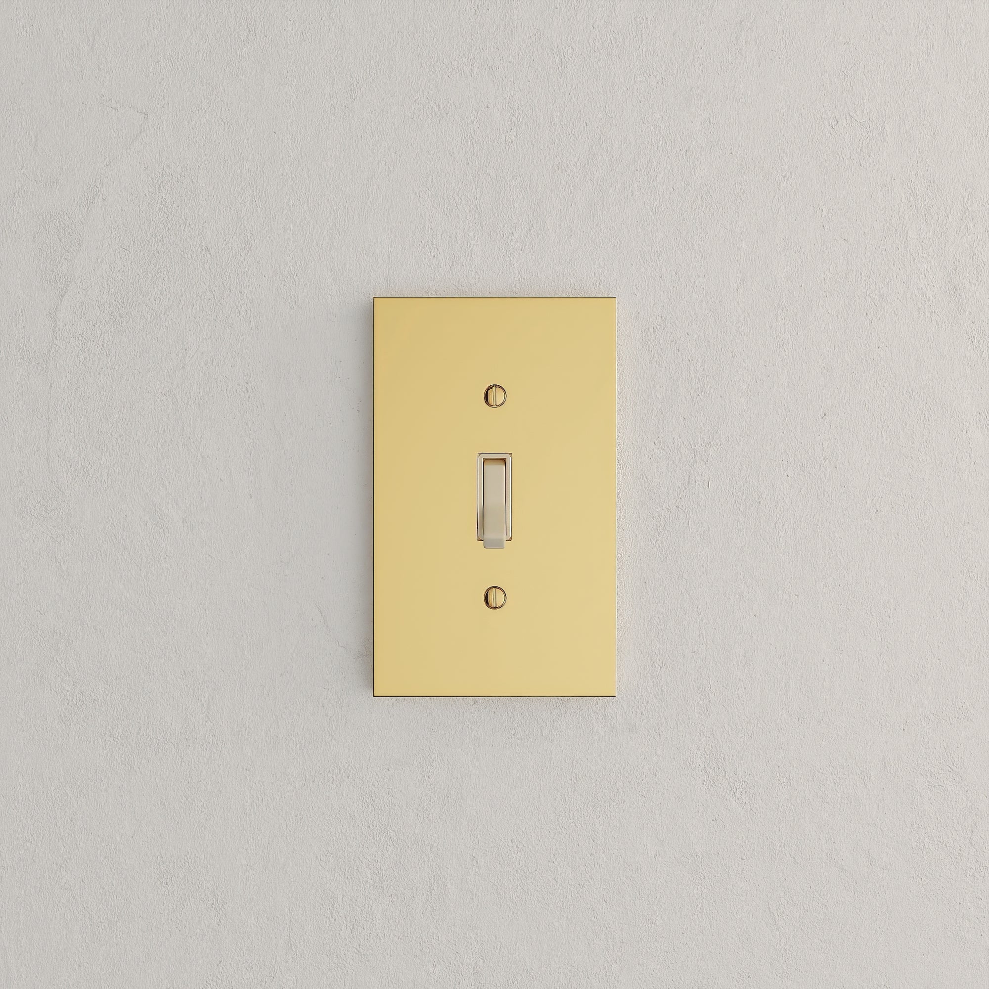 Solid brass Futura Toggle Wall Plate in Polished Brass finish