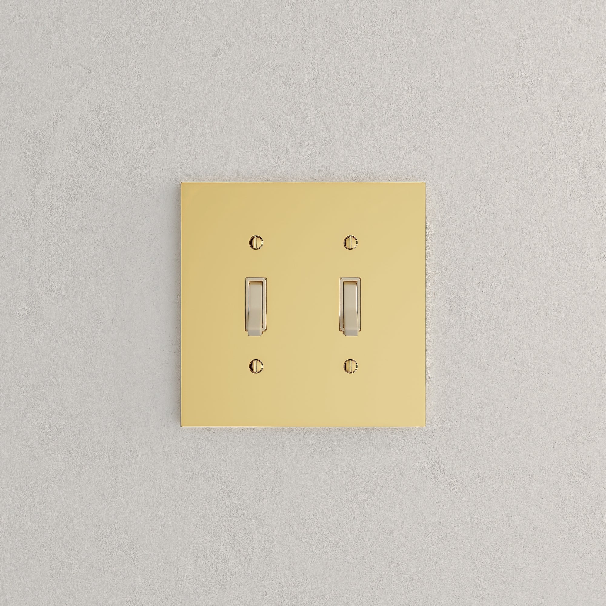 Solid brass Futura Toggle Wall Plate – Double in Polished Brass finish