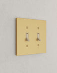 Solid brass Futura Toggle Wall Plate – Double in Satin Brass finish