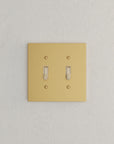 Solid brass Futura Toggle Wall Plate – Double in Satin Brass finish