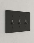 Solid brass Futura Toggle Wall Plate – Triple in Coal Black Brass finish