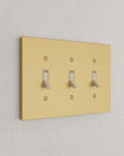 Solid brass Futura Toggle Wall Plate – Triple in Satin Brass finish