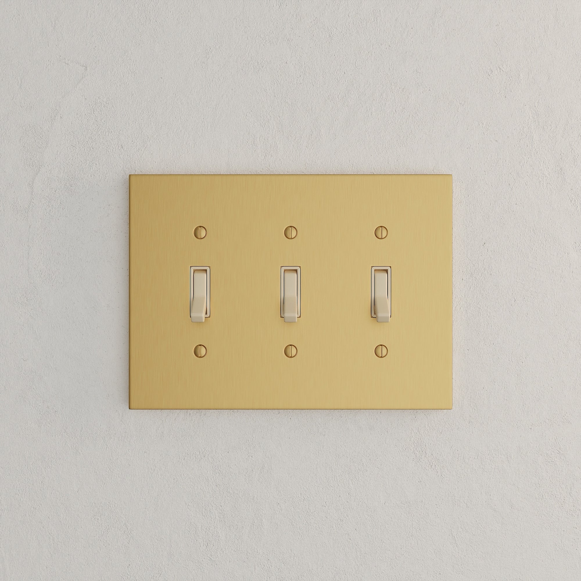 Solid brass Futura Toggle Wall Plate – Triple in Satin Brass finish