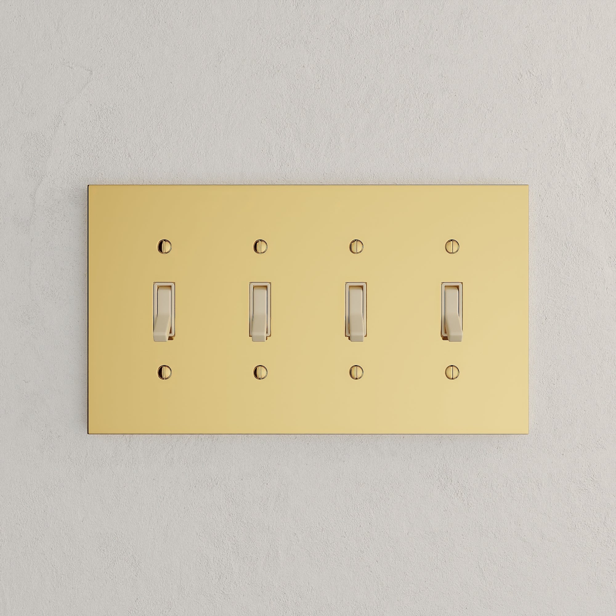 Solid brass Futura Toggle Wall Plate – Quad in Polished Brass finish