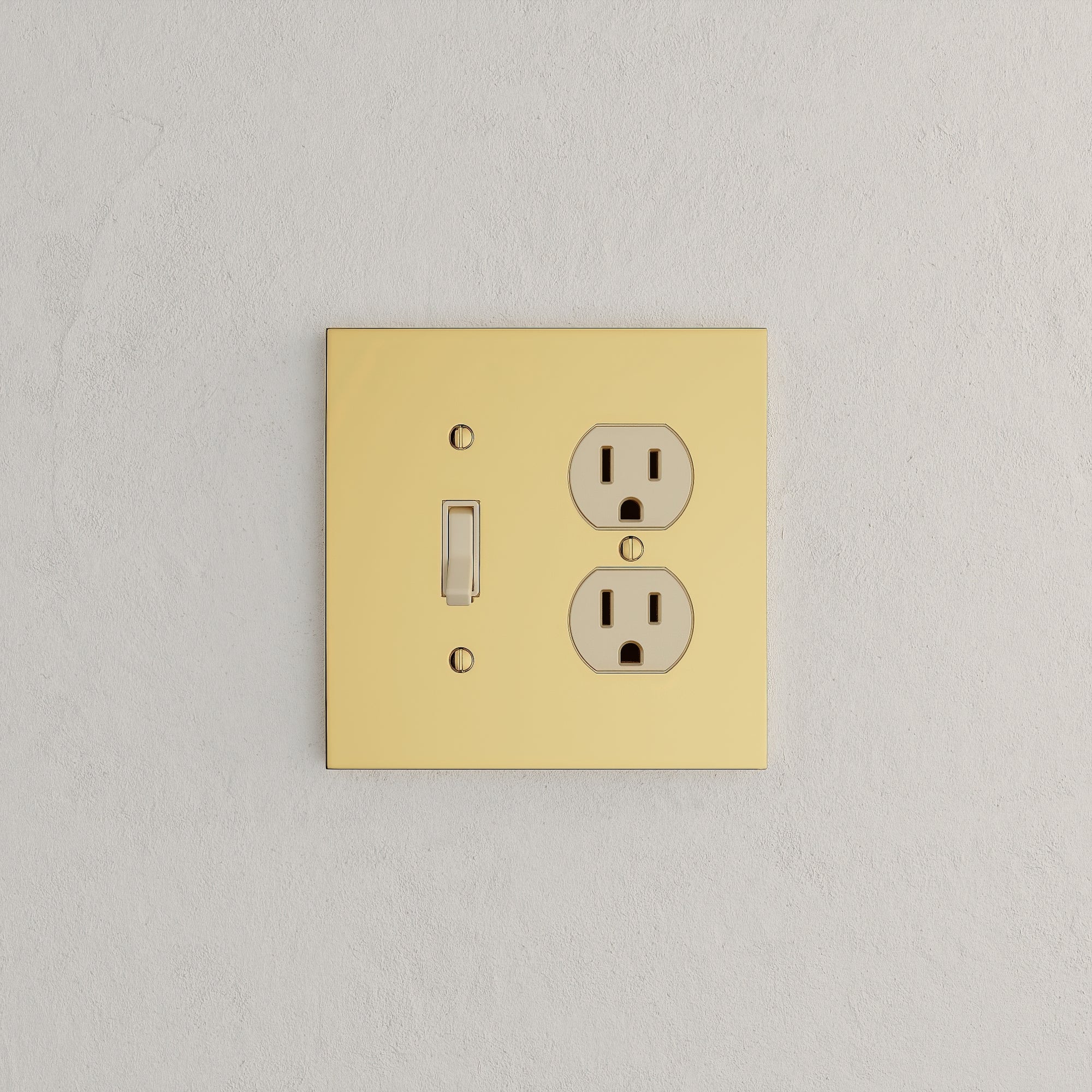 Solid brass Futura Toggle &amp; Outlet Wall Plate – Double in Polished Brass finish