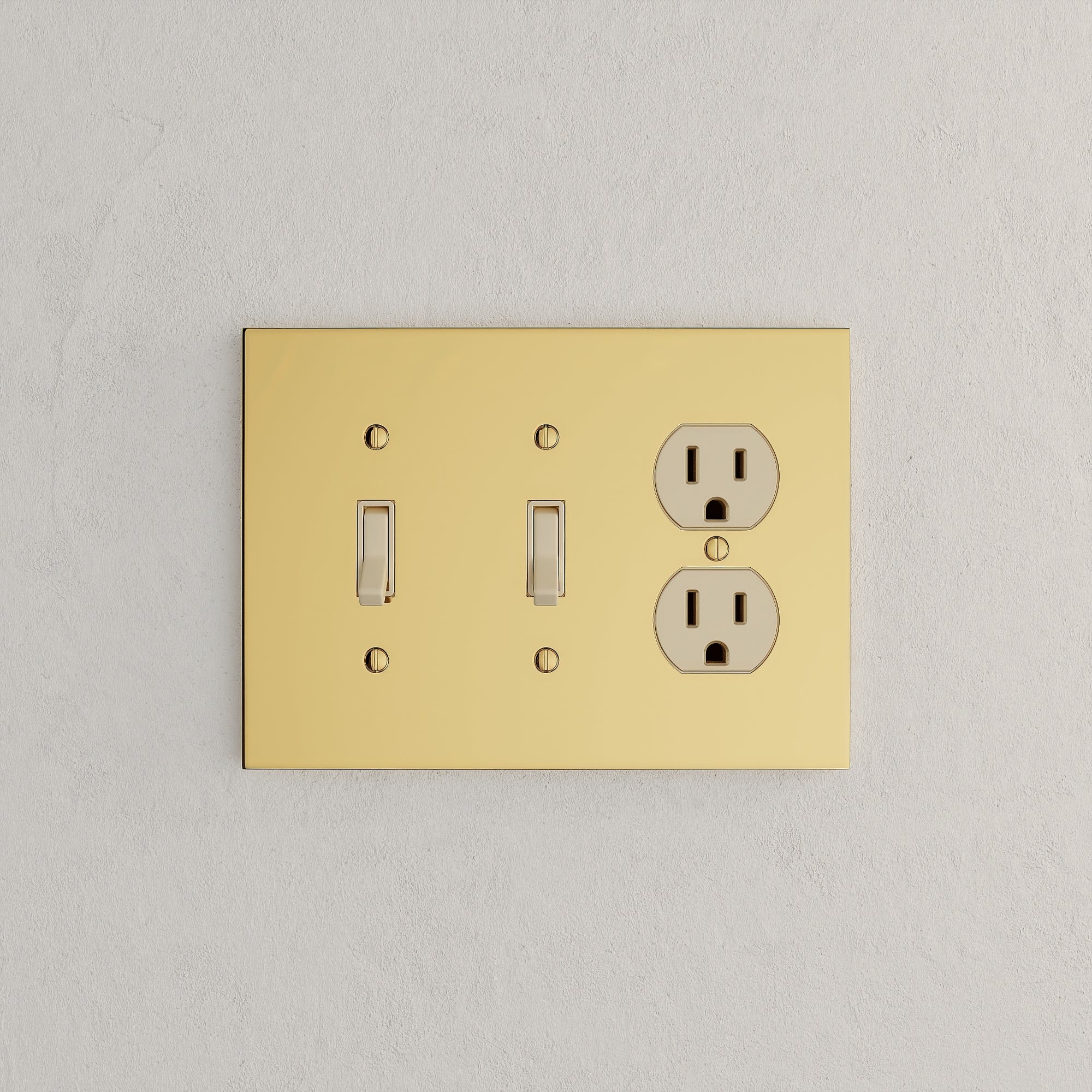Solid brass Futura Toggle &amp; Outlet Wall Plate – Triple in Polished Brass finish